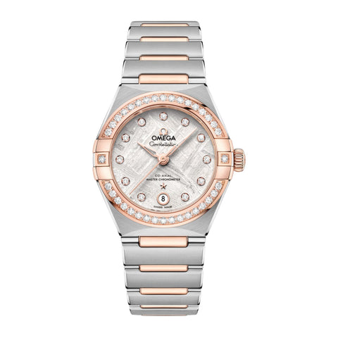 Omega Constellation 29mm - Meteorite-Omega Constellation 29mm - 131.25.29.20.99.001 - Omega Constellation in a 29mm stainless steel/Sedna gold diamond bezel case with grey meteorite dial on stainless steel/Sedna gold bracelet, featuring a date display and automatic movement.
