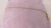 Shy Creation Diamond Flower Necklace in 14 karat yellow gold with diamonds totaling 0.69 carats.