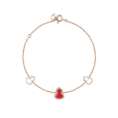 Qeelin Wulu Bracelet-Qeelin Wulu Bracelet - 18 karat rose gold with one red agate and diamond wulu in the center and two gold wulu on each side.