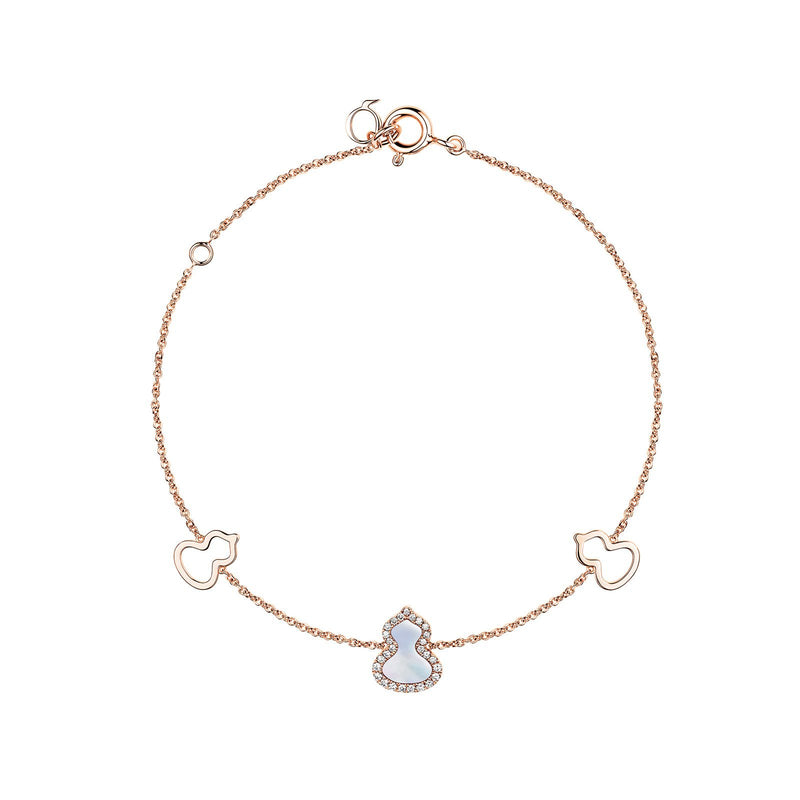 Qeelin Petite Wulu Bracelet-Qeelin Petite Wulu Bracelet in 18 karat rose gold with one mother-of-pearl and diamond wulu in the center and two gold wulu on each side.